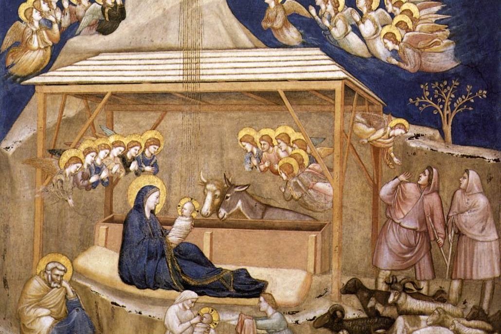 Fresco of the Nativity: Mary with the newborn Jesus under a wooden shelter, with angels, shepherds and animals around them.