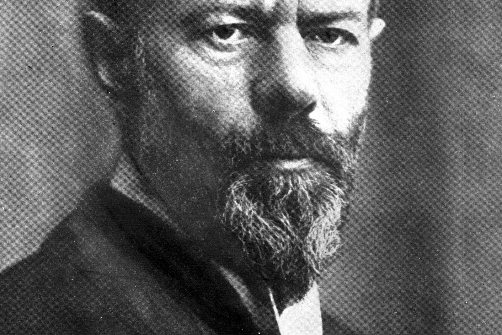 Black-and-white studio portrait of Max Weber, bearded, looking directly at the camera.